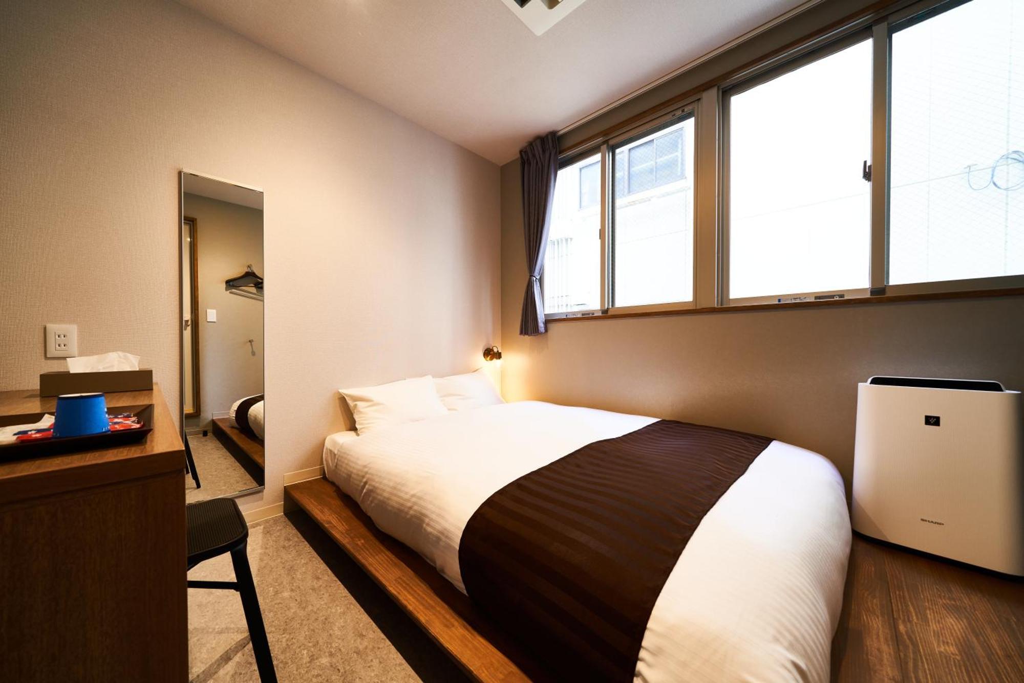 &And Hostel Shinsaibashi East Osaka Rum bild